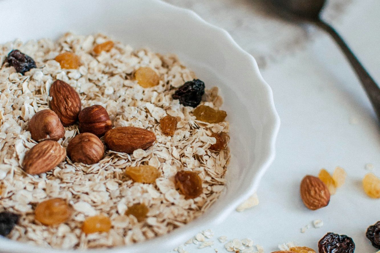 Holistic nutrition for health and energy Bowl of nourishing oats representing a balanced, holistic approach to nutrition